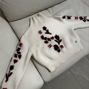 CHANEL Black and White Turtleneck Sweater with Elegant Design